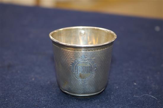 A French Cartier engine turned silver small beaker, 1.9 oz.